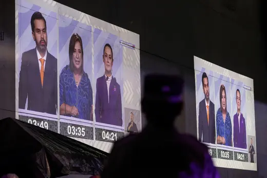 People watch a broadcast of the third Mexican presidential debate, held at the Tlatelolco University Cultural Center, in Mexico City, Mexico, on May 19, 2024.